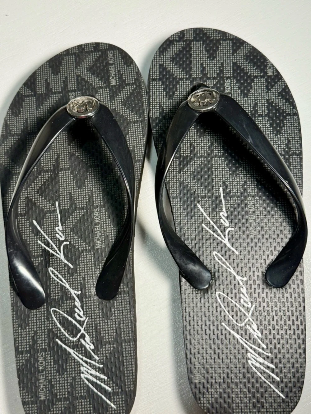 Michael Kors Black Logo Medallion Flip Flop Sandals